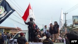 Indonesia Morowali Industrial Park (IMIP) workers protest against their working conditions outside the facility in Bungku, South Sulawesi, on Dec. 27, 2023, after at least 18 people were killed by an explosion at the Chinese-funded nickel-processing plant.