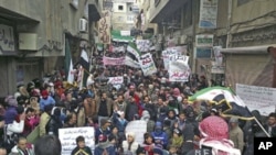 Demonstrators gather during a protest against Syria's President Bashar al-Assad after Friday prayers in Yabroud near Damascus March 2, 2012.