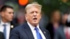 FILE - Former U.S. President Donald Trump walks outside Trump Tower in New York after the verdict in his criminal trial over hush money charges on May 30, 2024. Prosecutors in the case said on July 2 they would not fight Trump's request to delay sentencing in the felony case.