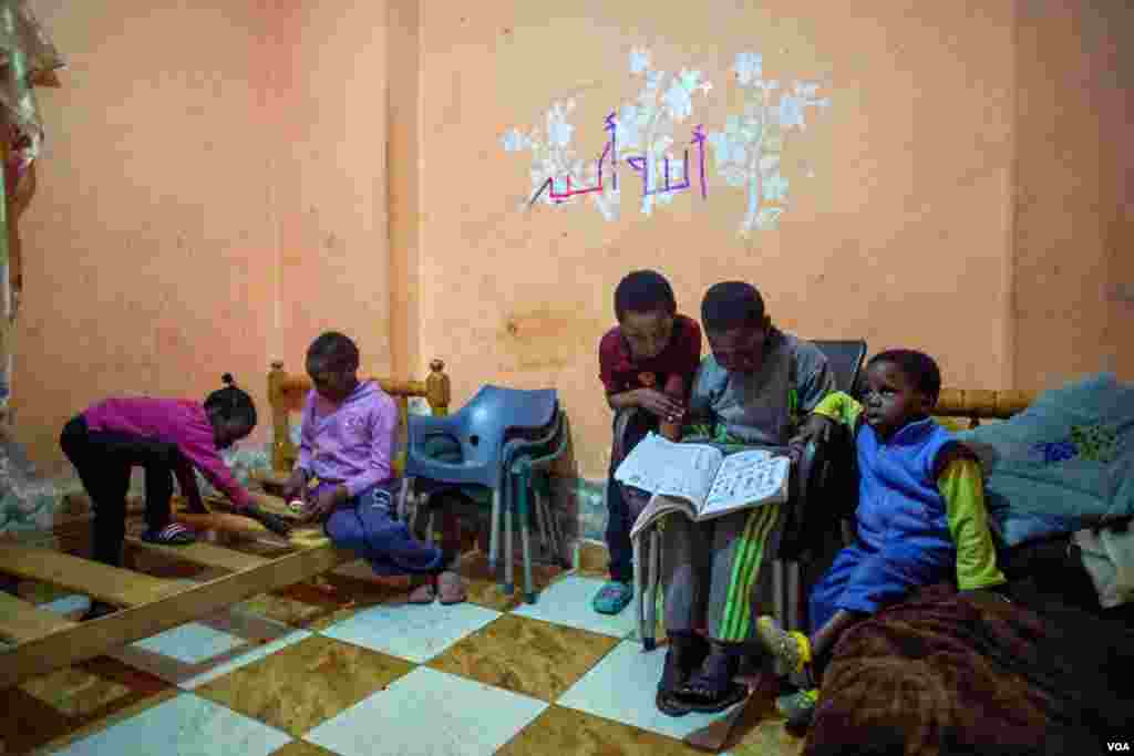 Sudanese children play in their house. Many of them have been discriminated against by their Egyptian counterparts in the streets or other public spaces. (H. Elrasam/VOA)