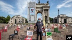 Restaurant owner Paolo Polli stages a protest in Milan, Italy, May, 9, 2020. 