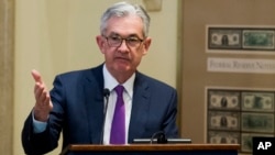 FILE - Federal Reserve Chairman Jerome Powell addresses the Federal Reserve Board's 15th annual College Fed Challenge Finals in Washington, Nov. 29, 2018.