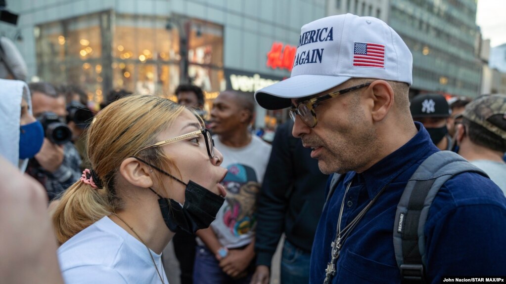 Trump supporters and anti-Trump protesters collide at a rally in New York City on Oct. 24, 2020. 