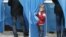 A boy visits a polling station during the parliamentary elections in Kiev, October 28, 2012. Ukrainian President Viktor Yanukovich's pro-business ruling party seems likely to win parliamentary elections on Sunday, but will face a re-energised opposition w