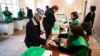 Georgians vote in the country's parliamentary elections at a polling station in Tbilisi on Oct. 26, 2024.