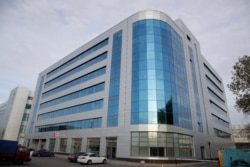 FILE - A business center building known as the "troll factory," an Internet Research Agency, a web of company allegedly controlled by Yevgeny Prigozhin, who has reported ties to Russian President Vladimir Putin, in St. Petersburg, Russia.