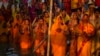 Hindu devotees gather by the river Brahmaputra and offer prayers to the setting sun during Chhath festival in Guwahati, northeastern Assam state, India, Nov. 7, 2024. 