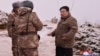 This picture taken on Jan. 28, 2024, and released by North Korea's official Korean Central News Agency on Jan. 29 shows North Korean leader Kim Jong Un inspecting a test-fire of the submarine-launched strategic cruise missile.