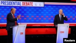 Primeiro debate Presidencial entre Donald Trump (esq) e Joe Biden
