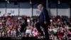 FILE - President Donald Trump arrives at W.K. Kellogg Airport to attend a campaign rally in Battle Creek, Mich., , Dec. 18, 2019.