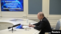 რუსეთის პრეზიდენტი ვლადიმირ პუტინი სტრატეგიული ბირთვული ძალების წვრთნას ადევნებს თვალს. მოსკოვი, რუსეთი. 26 ოქტომბერი, 2022 წ.