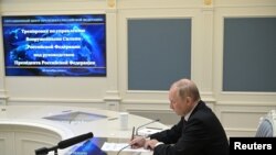 Ruski predsednik Vladimir Putin nadgleda vežbe ruskih strateških nuklearnih snaga putem video linka iz Moskve, 26. oktobra 2022. Foto: Rojters via Sputnjik/Aleksej Babuškin/Kremlj