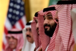 FILE - In this June 29, 2019 file photo, Saudi Arabia's Crown Prince Mohammed bin Salman listens during the G-20 summit in Osaka, Japan.