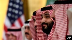 FILE - In this June 29, 2019 file photo, Saudi Arabia's Crown Prince Mohammed bin Salman listens during the G-20 summit in Osaka, Japan.