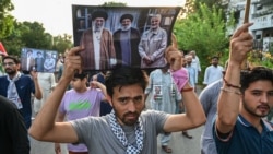 Des activistes participent à une manifestation contre la mort de Hassan Nasrallah à Islamabad le 29 octobre 2024.