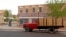 A flatbed Ford truck permanently parked at Standin' on the Corner Park, in Winslow, Arizona, as a tribute to the Eagles song 'Take it Easy,' written by Jackson Browne & Glenn Frey. 