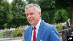 FILE - Jon Huntsman, U.S. ambassador to Russia, arrives at the security check point entrance of the White House in Washington, May 30, 2018.