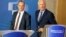 Britain's Secretary of State for Exiting the European Union Dominic Raab, left, and EU chief Brexit negotiator Michel Barnier arrive for a press conference at EU headquarters in Brussels, Aug. 21, 2018.