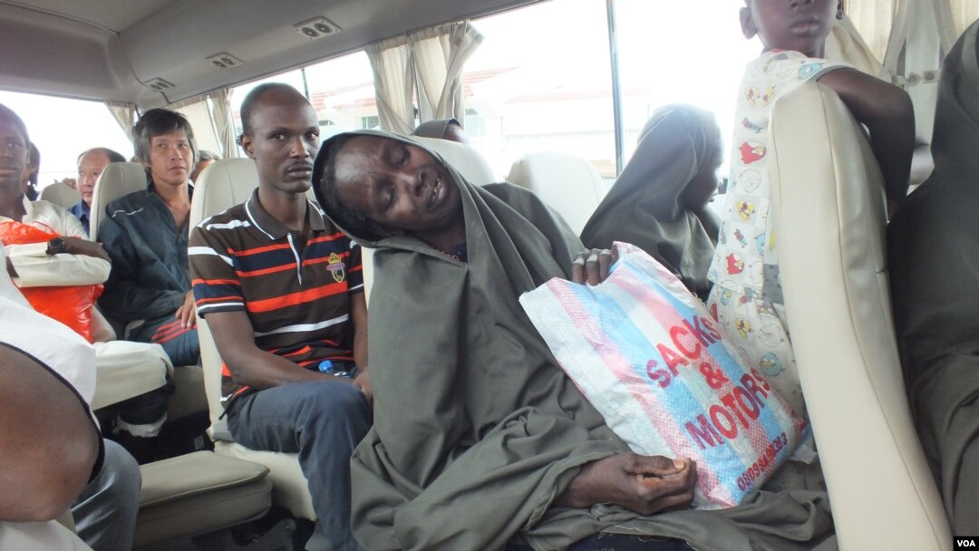 After months of captivity by suspected Boko Haram militants, ex-hostages arrive at Cameroon's Yaounde Nsimalen International Airport.