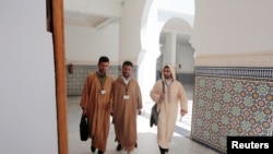 Students walk to attend religious courses at Mohammed VI Institute for training Imams in Rabat, Morocco, April 16, 2019. 