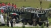 Former South African President Nelson Mandela's coffin arrives at the family gravesite for burial at his ancestral village of Qunu in the Eastern Cape province, 900 km (559 miles) south of Johannesburg, December 15, 2013.