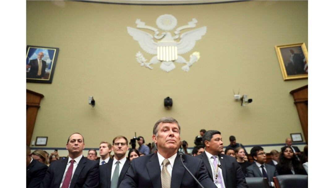 Acting Director of National Intelligence Joseph Maguire takes his seat before testifying before the House Intelligence Committee on Capitol Hill in Washington, Sept. 26, 2019.