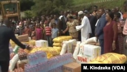 Internally displaced persons receive gifts from well-wishers in Yaounde, Cameroon, May 12, 2019. 