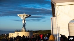 People attend the launch of Ethiopia's first micro-satellite (ETRSS-1) at the Entoto Observatory on the outskirts of the capital Addis Ababa, Dec. 20, 2019.