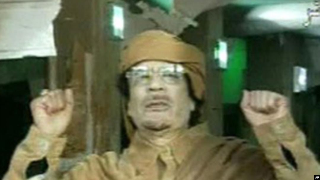 This image broadcast on Libyan state television Feb. 22, 2011, shows Libyan leader Moammar Gadhafi as he addresses the nation in Tripoli