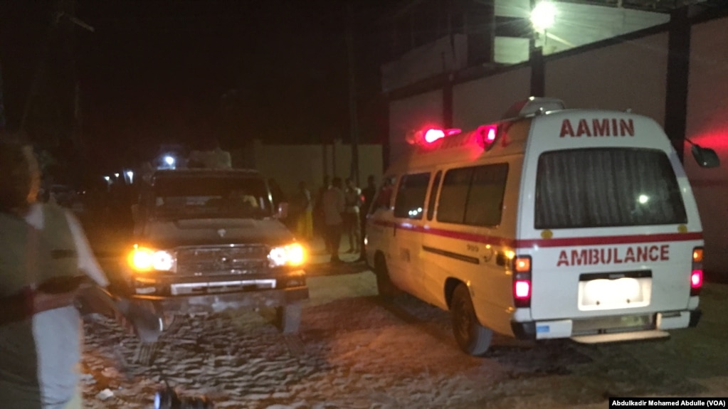 FILE - An Aamin Ambulance waits as Somali security forces end an al-Shabab siege of two Mogadishu restaurants, June 2017.