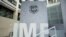 FILE—International Monetary Fund logo is seen inside the headquarters at the end of the IMF/World Bank annual meetings