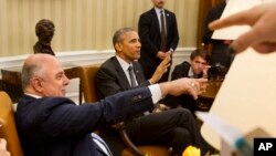 Presiden AS Barack Obama dan PM Irak Haider al-Abadi dalam konferensi pers di Gedung Putih, April 2015. (AP/Jacquelyn Martin)