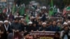 Pakistani Shiite Muslims participate in a rally to condemn the killing of Iranian Revolutionary Guard Gen. Qassem Soleimani by a U.S. airstrike in Iraq, in Islamabad, Pakistan, Jan. 5, 2020.