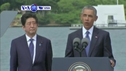 VOA60 America - Pearl Harbor Victims Honored by Obama, Japan's PM Abe