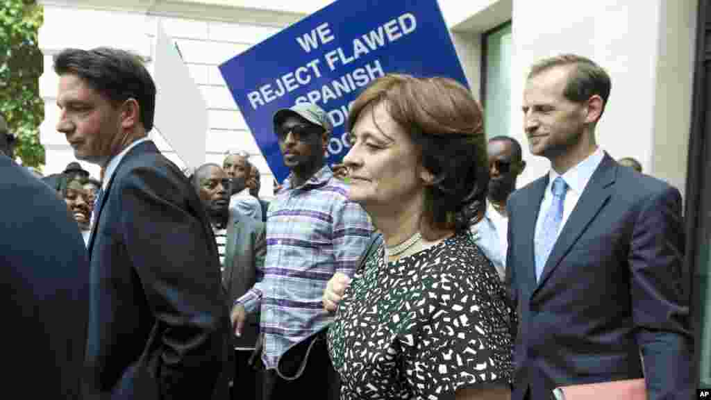 Britain Rwanda Arrest