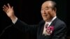 In this Saturday, June 25, 2005 photo, Unification Church leader Rev. Sun Myung Moon speaks during his "Now is God's Time" rally in New York.