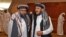 Des membres de la délégation talibane arrivent pour la signature d'un accord américano-taliban à Doha au Qatar, le 29 février 2020.