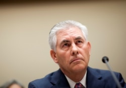 FILE - Rex Tillerson, then-chairman and CEO of ExxonMobil, testifies about the company's acquisition of XTO Energy before the House Energy and Environment Subcommittee on Capitol Hill in Washington.