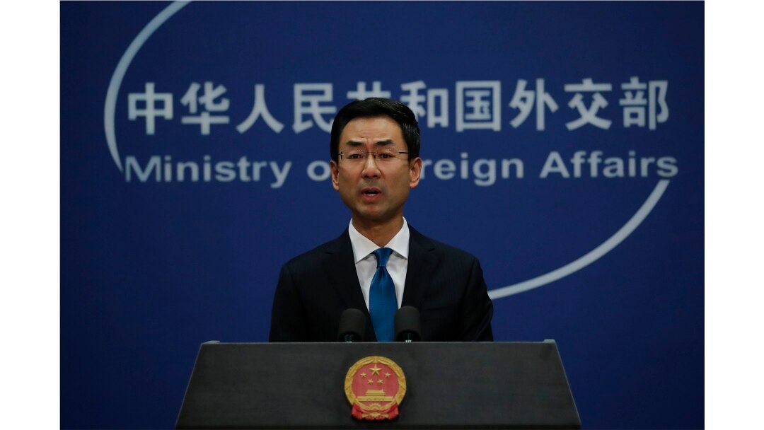 FILE - Chinese Foreign Ministry spokesman Geng Shuang speaks during a daily briefing at the Ministry of Foreign Affairs office in Beijing, Nov. 28, 2019.