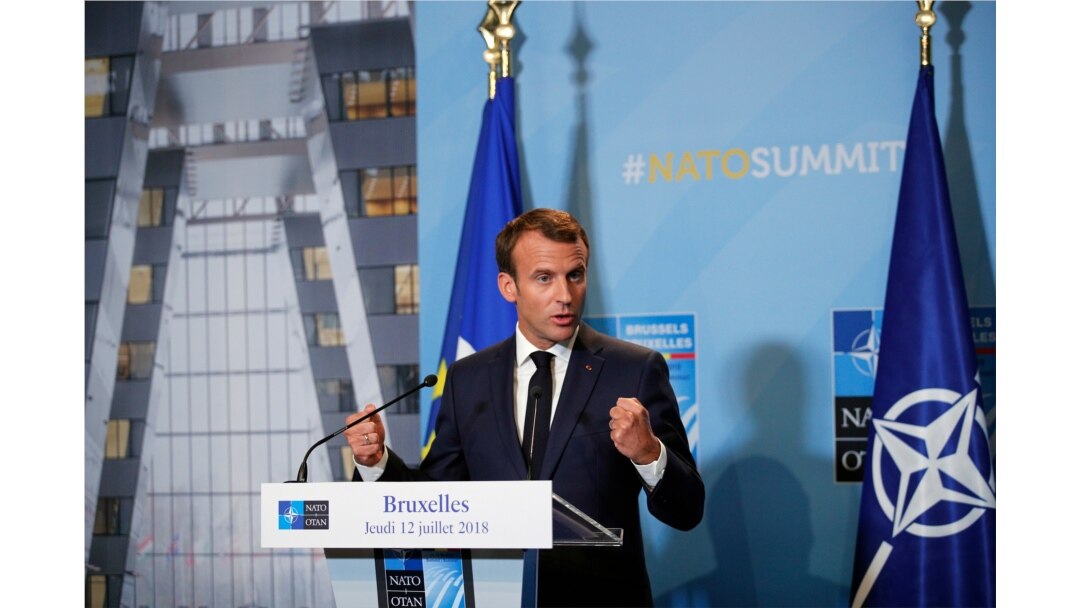 FILE - French President Emmanuel Macron speaks at a press conference at NATO headquarters in Brussels, Belgium, July 12, 2018.