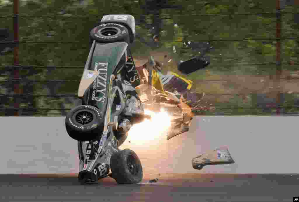 Ed Carpenter hits the wall in the second turn during practice before qualifications for the Indianapolis 500 auto race at Indianapolis Motor Speedway in Indianapolis, Indiana, USA.