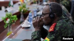 FILE - Military personnel attend the meeting of the ECOWAS Committee of Chiefs of Defense as they make plans to deploy the ECOWAS standby force to the Republic of Niger, in Accra, Ghana, August 18, 2023.