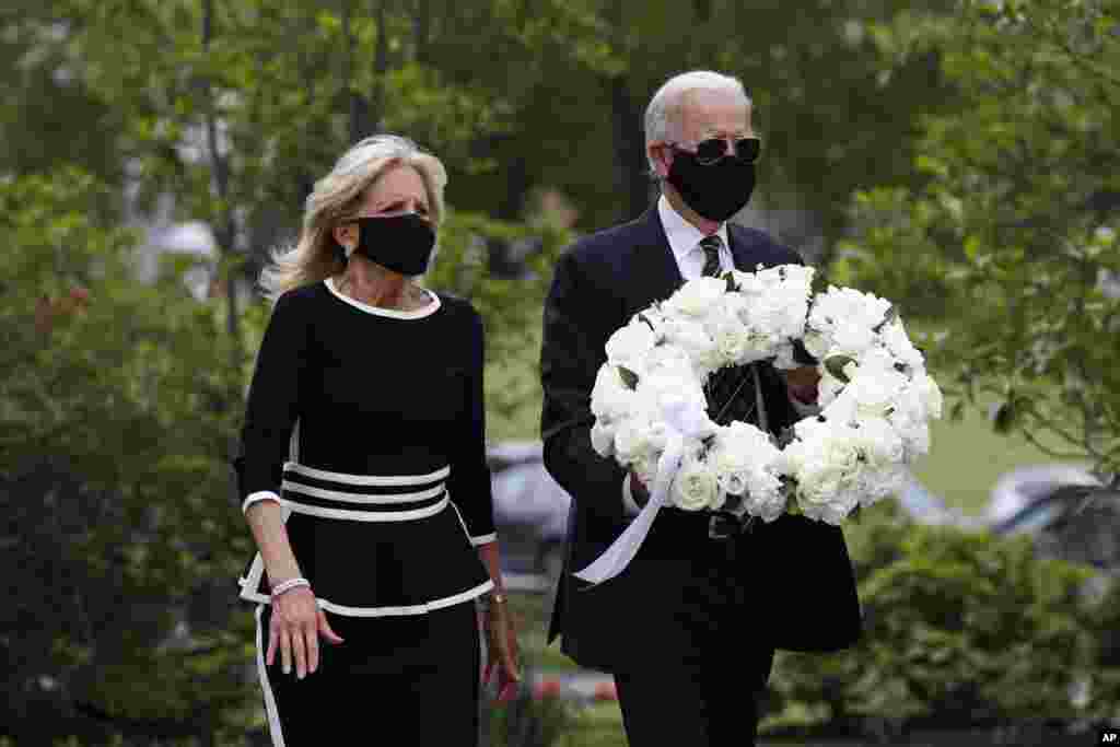 Democratic presidential candidate, former Vice President Joe Biden, and his wife Jill Biden arrive to place a wreath at the Delaware Memorial Bridge Veterans Memorial Park, in New Castle, Delaware.