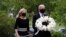 Democratic presidential candidate, former Vice President Joe Biden, and his wife Jill Biden arrive to place a wreath at the Delaware Memorial Bridge Veterans Memorial Park, in New Castle, Delaware, May 25, 2020. 