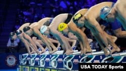 Swimmers on in the starting block before a men's 200m freestyle semifinal during the US Olympic Team Trials Swimming competition at CHI Health Center Omaha, Nebraska, June 14, 2021.