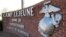 FILE - This photo, taken March 19, 2013, features a globe and anchor display at the entrance to Camp Lejeune, North Carolina.