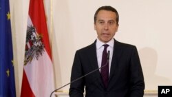 FILE - Austrian Chancellor Christian Kern speaks to the media at the federal chancellery in Vienna, Austria, May 9, 2017.