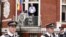 WikiLeaks founder Julian Assange steps onto the balcony before speaking to the media outside the Ecuador embassy in west London, August 19, 2012.
