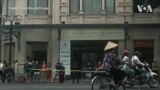 Hình ảnh người phụ nữ Việt Nam đi xe đạp đội nón lá trong video trên Twitter của TT Donald Trump 14/11/2017.
