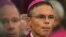FILE - Bishop Franz-Peter Tebartz-van Elst (R) attends mass during a meeting of German prelates in Fulda, Germany.